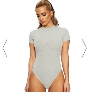 Naked wardrobe bodysuit “lookin snatched bodysuit”